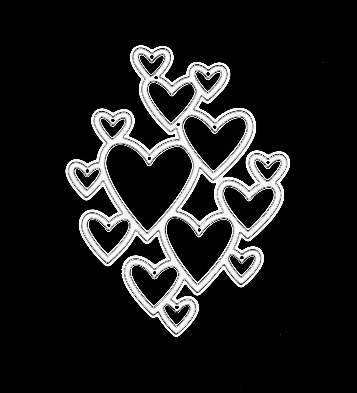 Heart cluster metal cutting die on black background