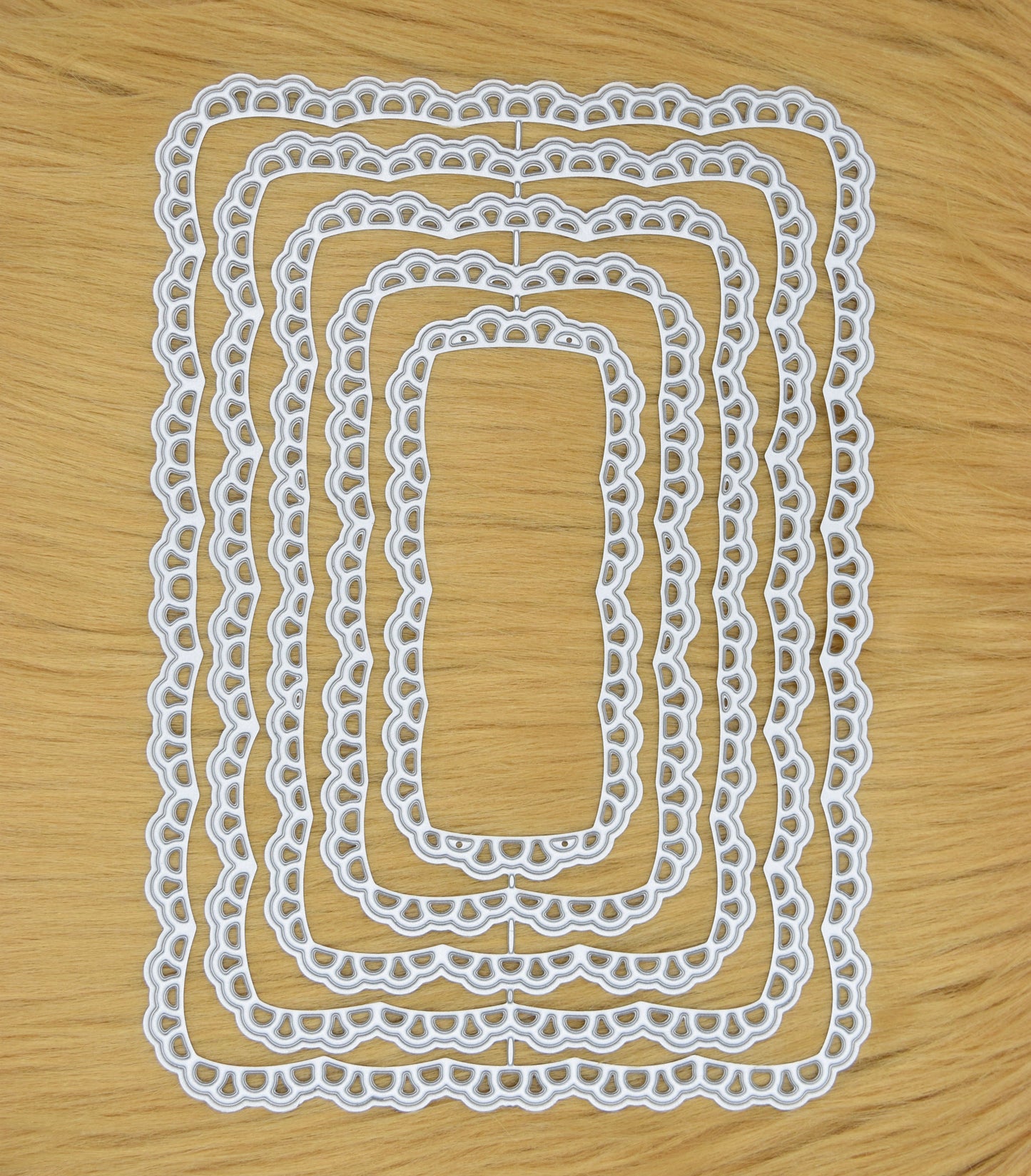 Lace rectangle nesting dies on faux fur background