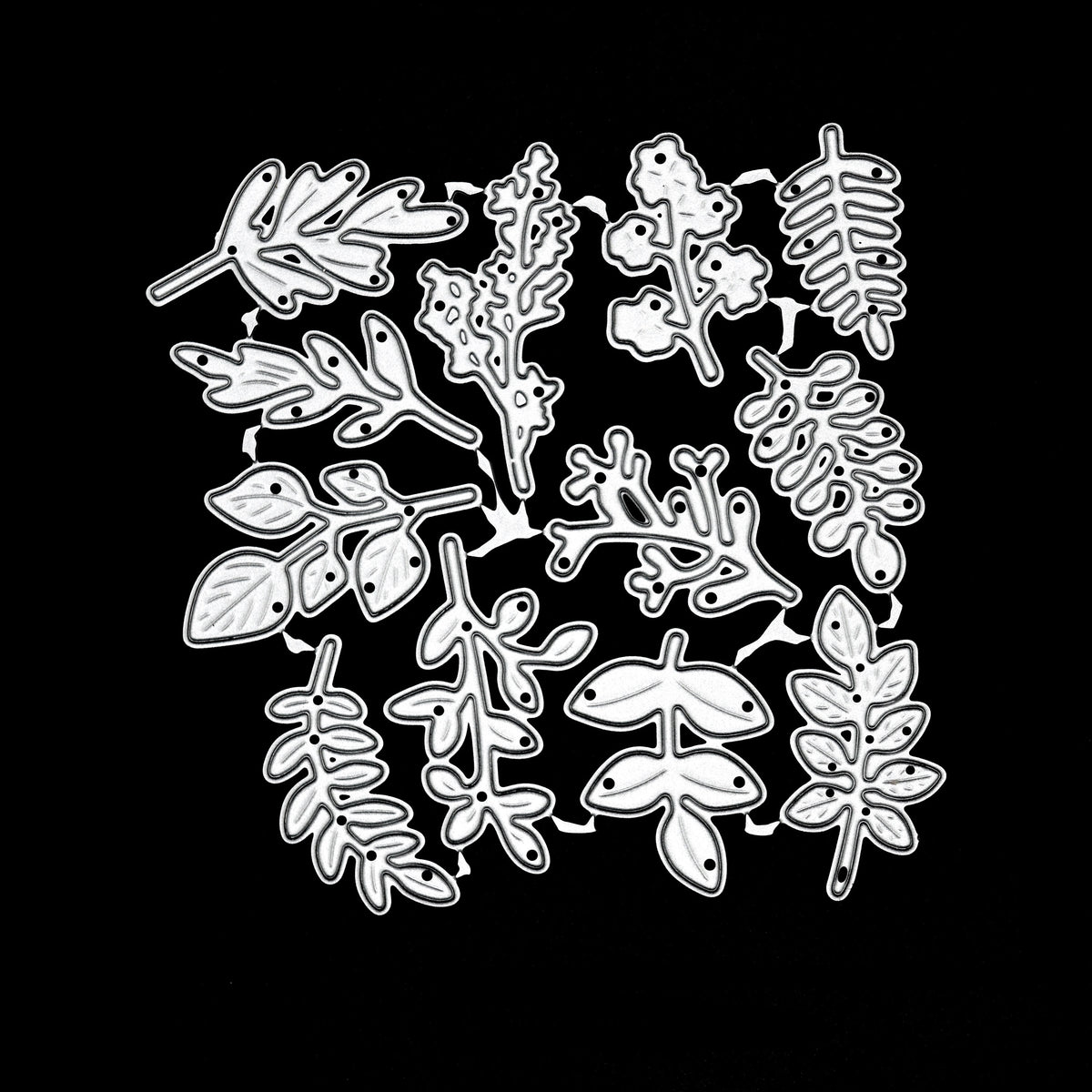 Connected set of 12 leaf and botanical sprig metal cutting dies displayed on a black background
