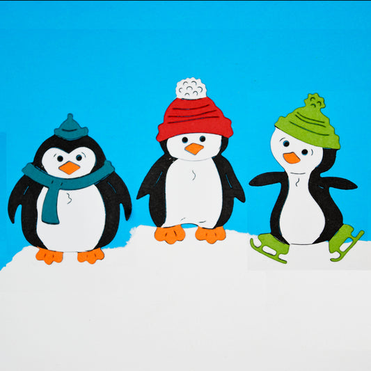 Finished Christmas penguin die cuts for festive card making and winter crafts