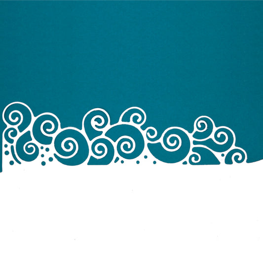 Teal cardstock cut with a decorative swirly waves border metal cutting die for card making and papercraft