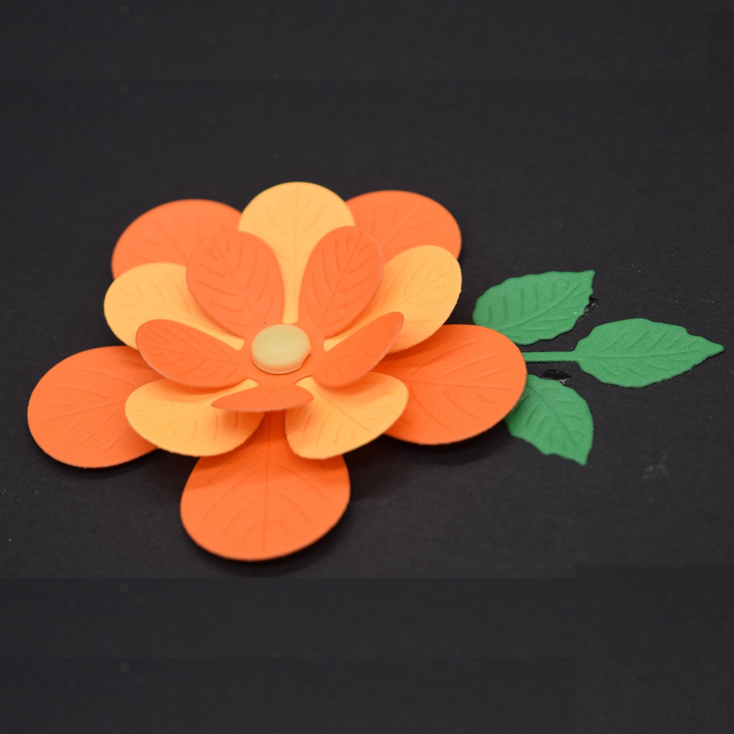 Finished 3D layered flower with leaves showing dimensional card making effect