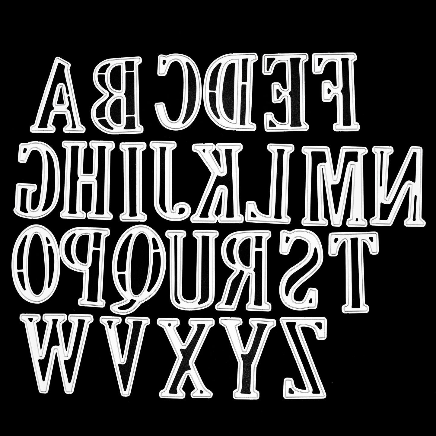 Complete uppercase alphabet metal cutting die set displayed on a black background