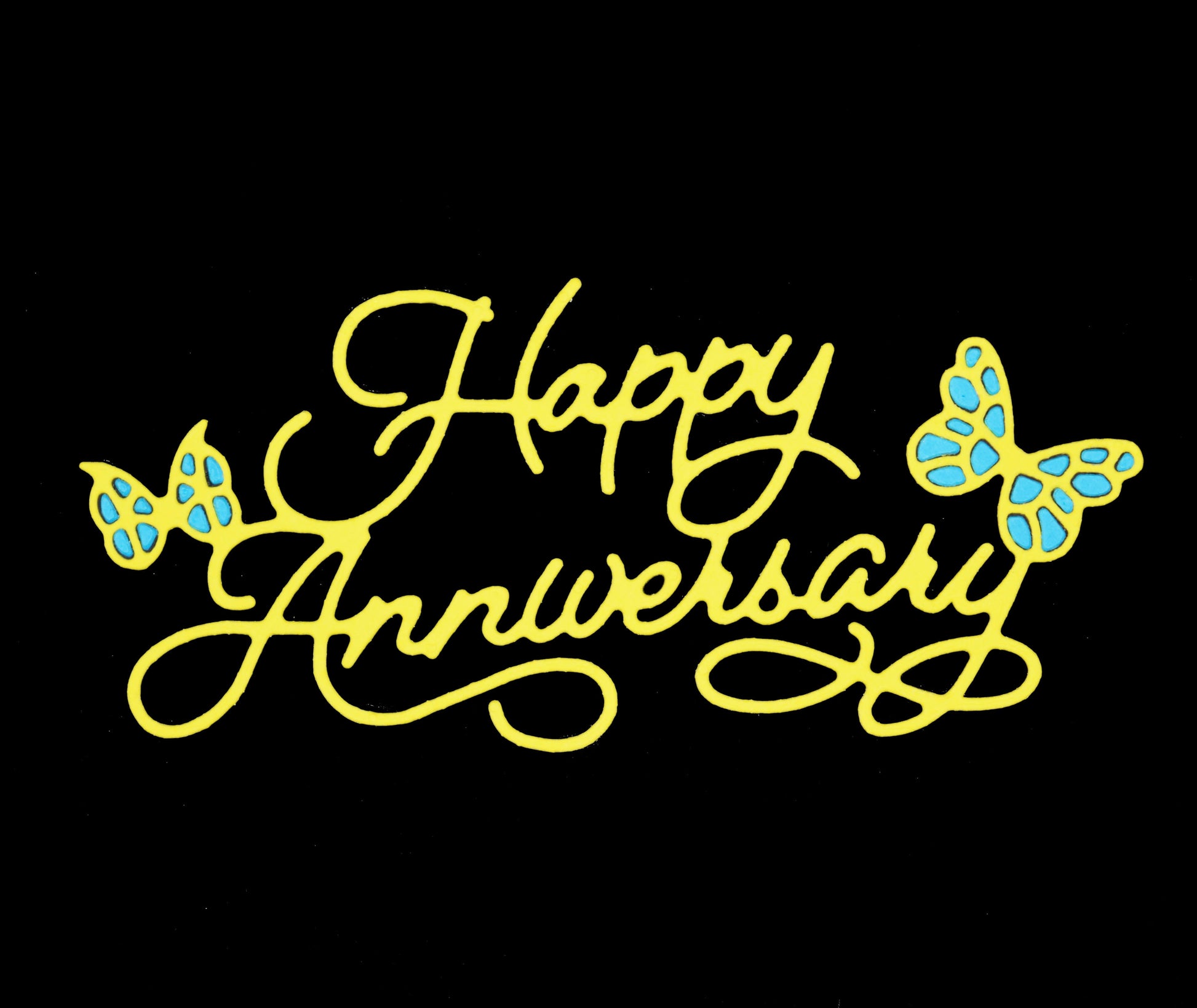 Happy Anniversary script sentiment die cut in yellow with layered butterfly details for anniversary card making and papercraft