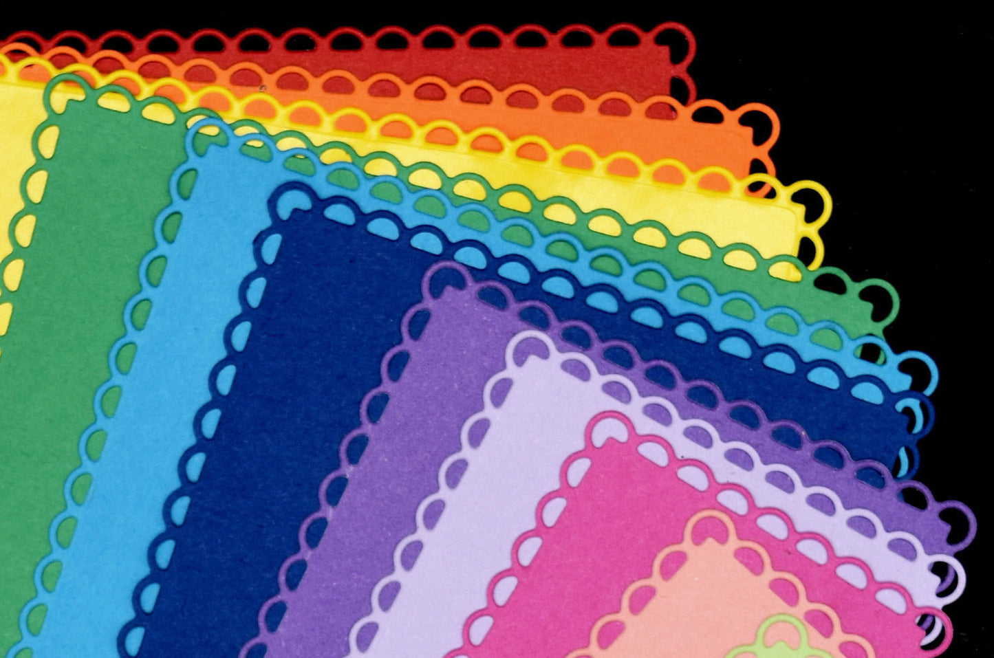 Colourful A6 layered rectangle scalloped die cuts in graduated rainbow sizes for card making and papercrafts