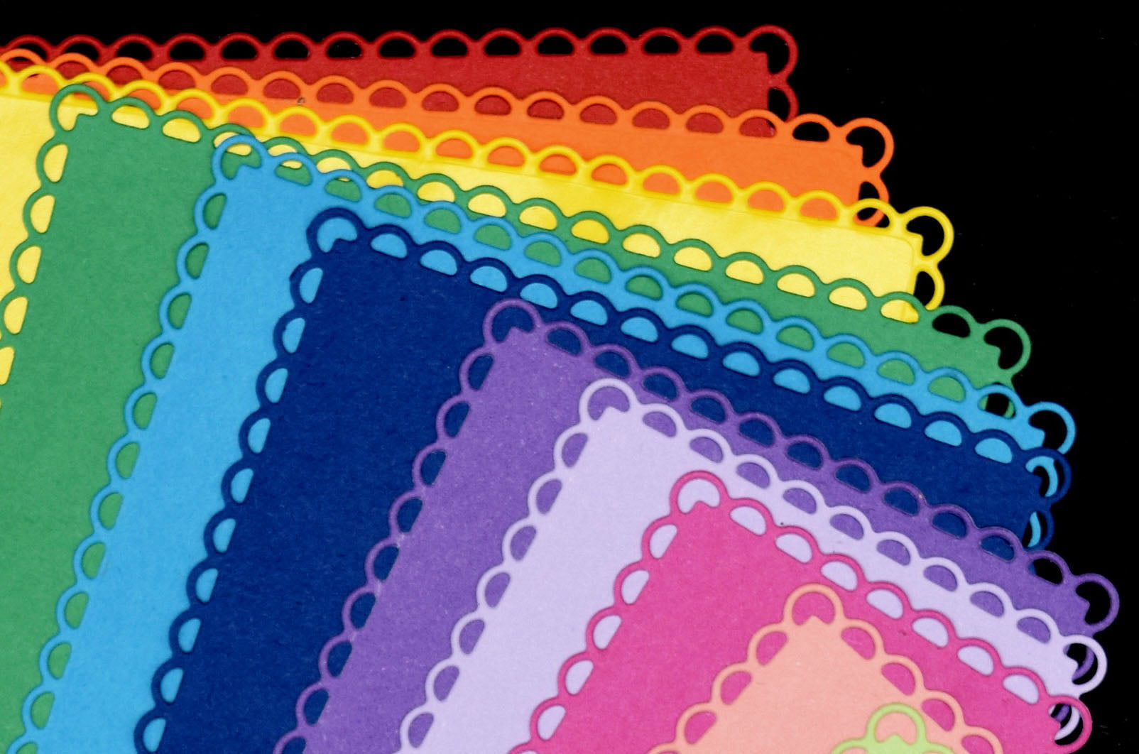 Colourful A6 layered rectangle scalloped die cuts in graduated rainbow sizes for card making and papercrafts