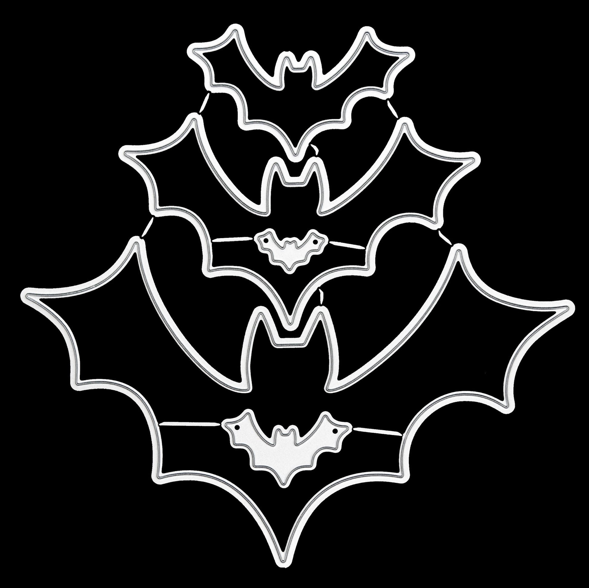 Bat shaped nesting metal cutting dies set on black background