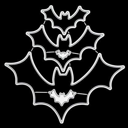 Bat shaped nesting metal cutting dies set on black background