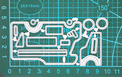 Camper van metal cutting dies on cutting mat showing size