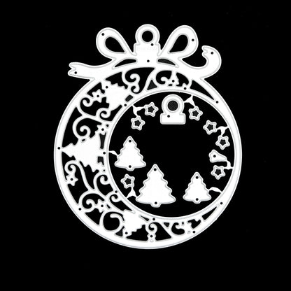 Large Christmas bauble frame metal cutting dies on black, showing the bow, swirls and joined tree, star and cap pieces.