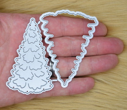 3D Christmas tree cutting die set shown in hand for size reference