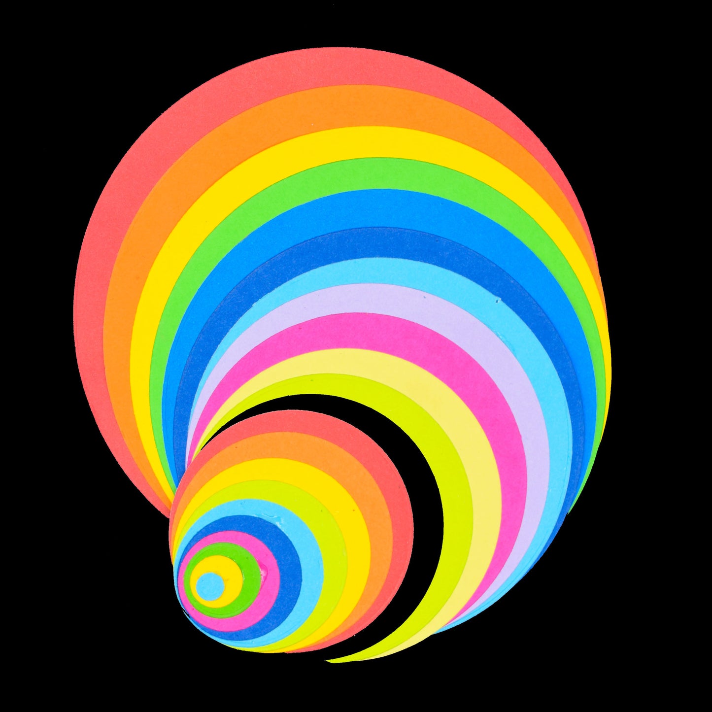 Layered rainbow circles created using nesting circle metal cutting dies