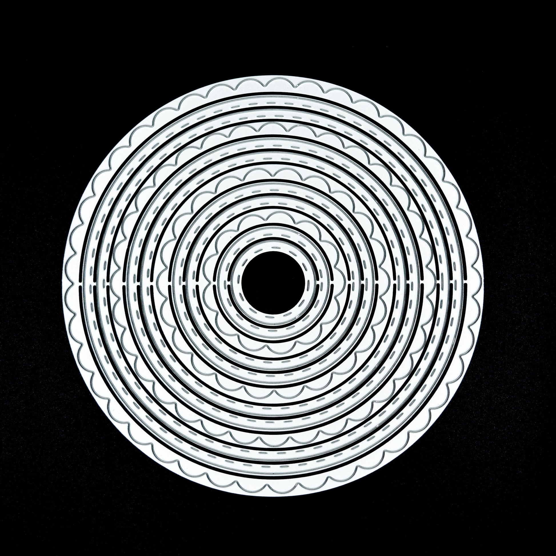 Nest of circle metal cutting dies scalloped and stitched edges
