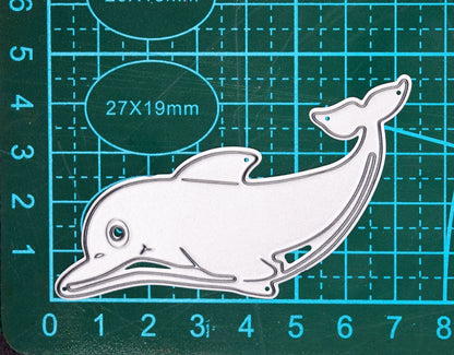 Dolphin metal cutting die on cutting mat showing approximate size and detail lines