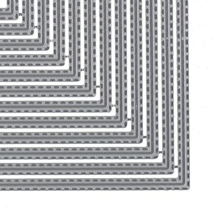 Close-up view of the cutting edges and decorative stitch details on the square nesting metal dies.