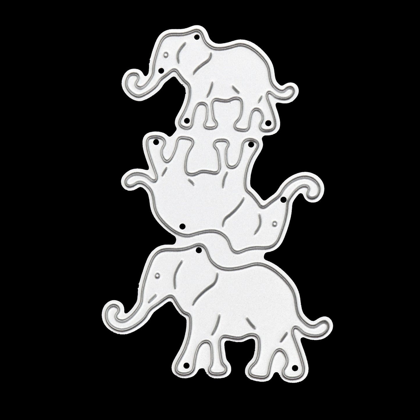 Three elephant metal cutting dies on black background for handmade cards scrapbooking and animal themed paper crafts