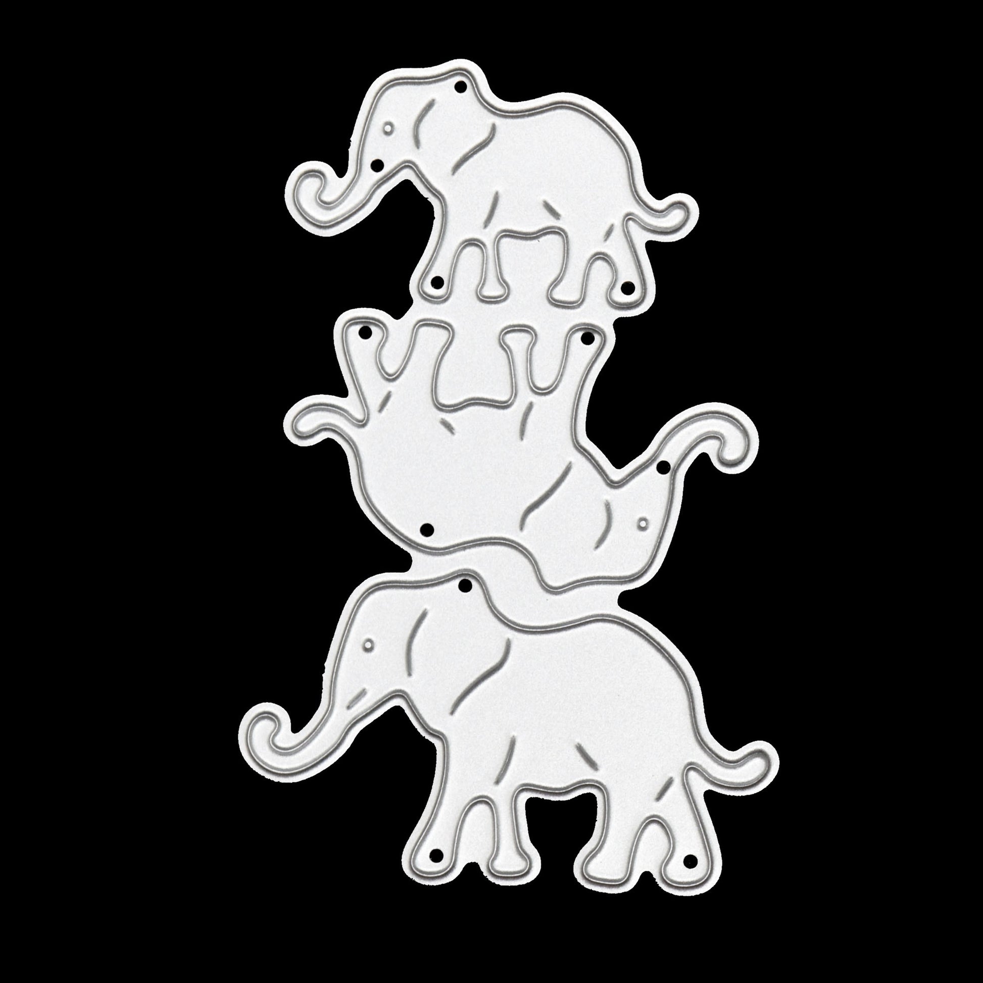 Three elephant metal cutting dies on black background for handmade cards scrapbooking and animal themed paper crafts