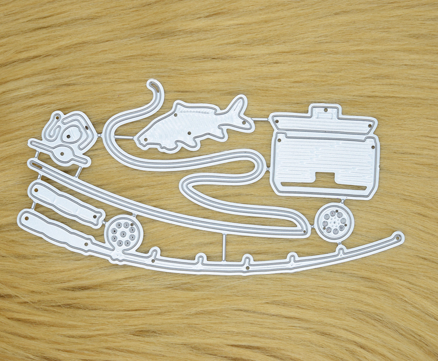 Fishing rod and tackle box cutting dies with fish line reel and float accessories