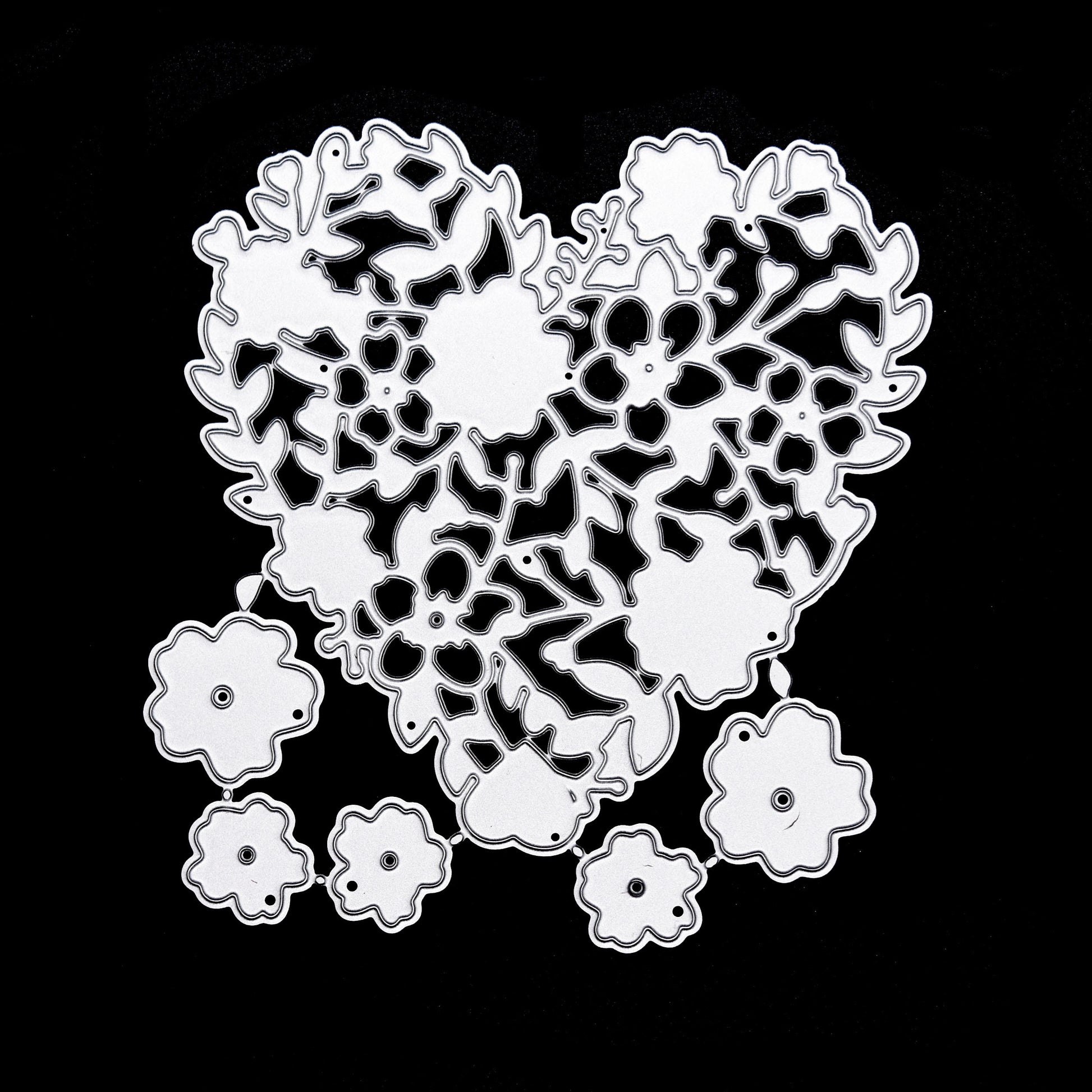 Floral heart metal cutting die set on black background