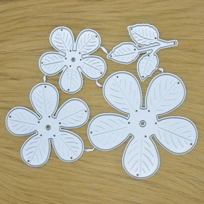 3D flower metal cutting dies set with leaves on faux fur background showing full set