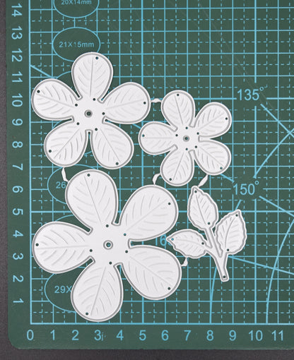 3D flower metal cutting dies on cutting mat showing different petal sizes and layout
