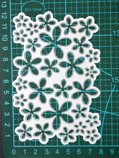 Flower background die on cutting mat showing measurements