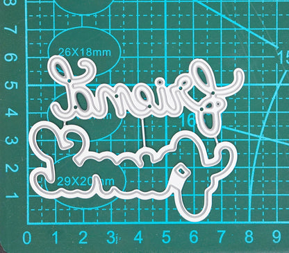 Layered Friend script word cutting die set shown on measuring mat for size reference