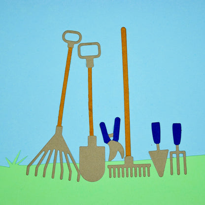 Garden hand tool die cuts made from coloured cardstock including a shovel, rake, fork, trowel and secateurs