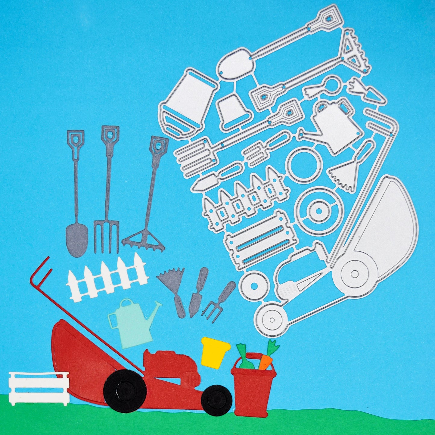 Gardening tools metal cutting dies shown alongside finished cut pieces for card making and craft projects