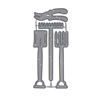 Gardening tools metal cutting die set with spade, fork, rake and secateurs shown on a white background.