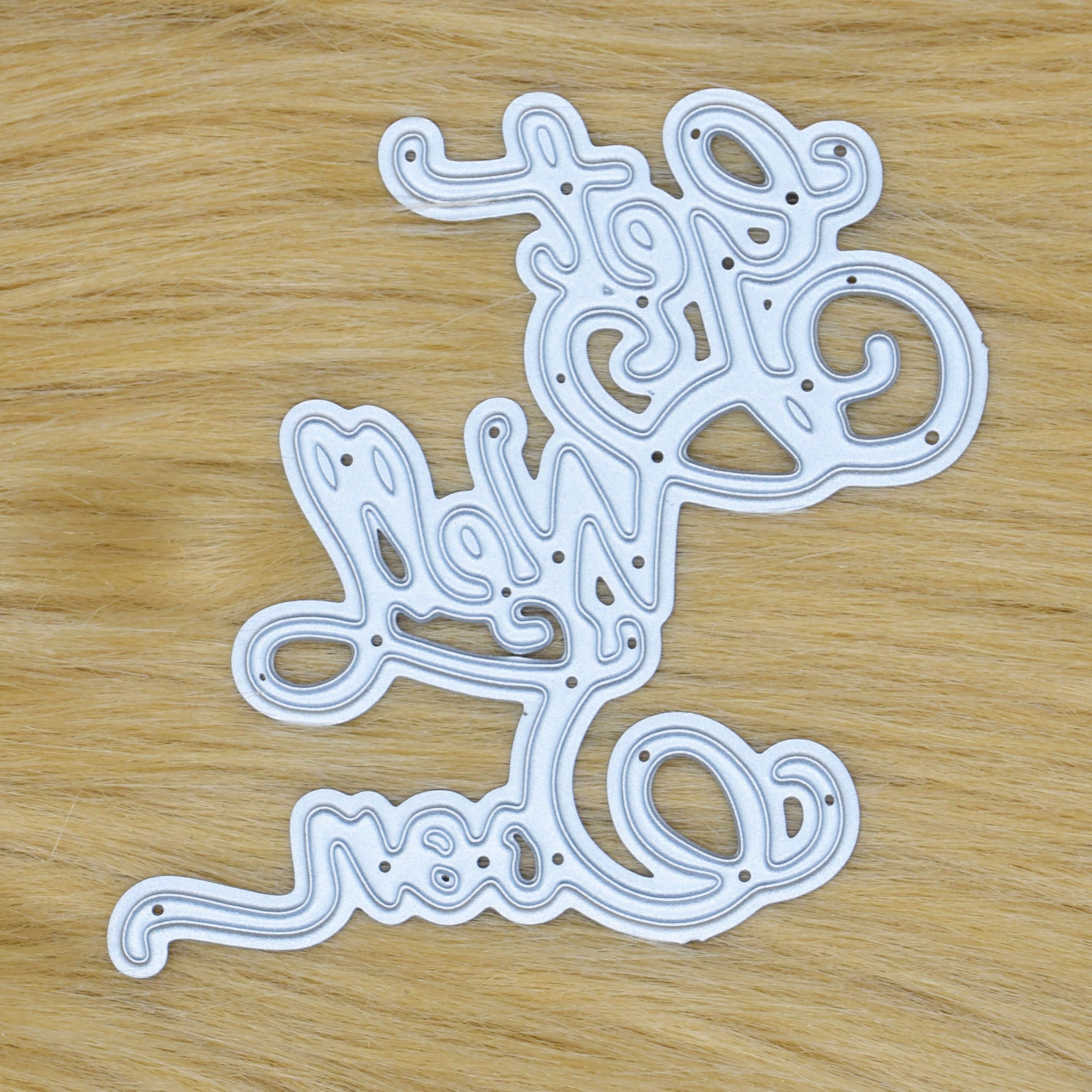 Get Well Soon script sentiment metal cutting die for card making and scrapbook crafts shown on faux fur background
