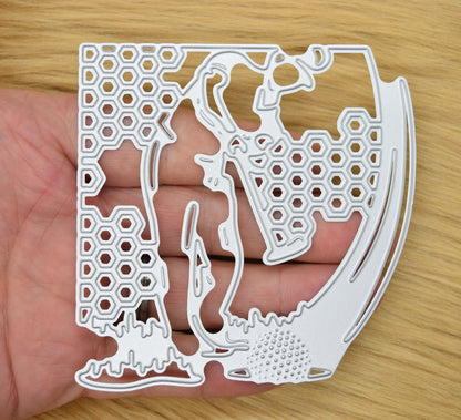 Golfer metal cutting die held in hand showing scale and detail
