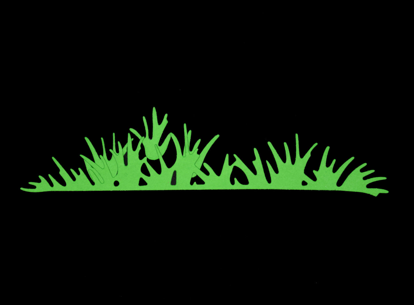Grass border die example cut from green card for card making