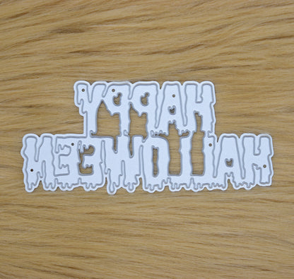 Happy Halloween drip text metal cutting die on faux fur background
