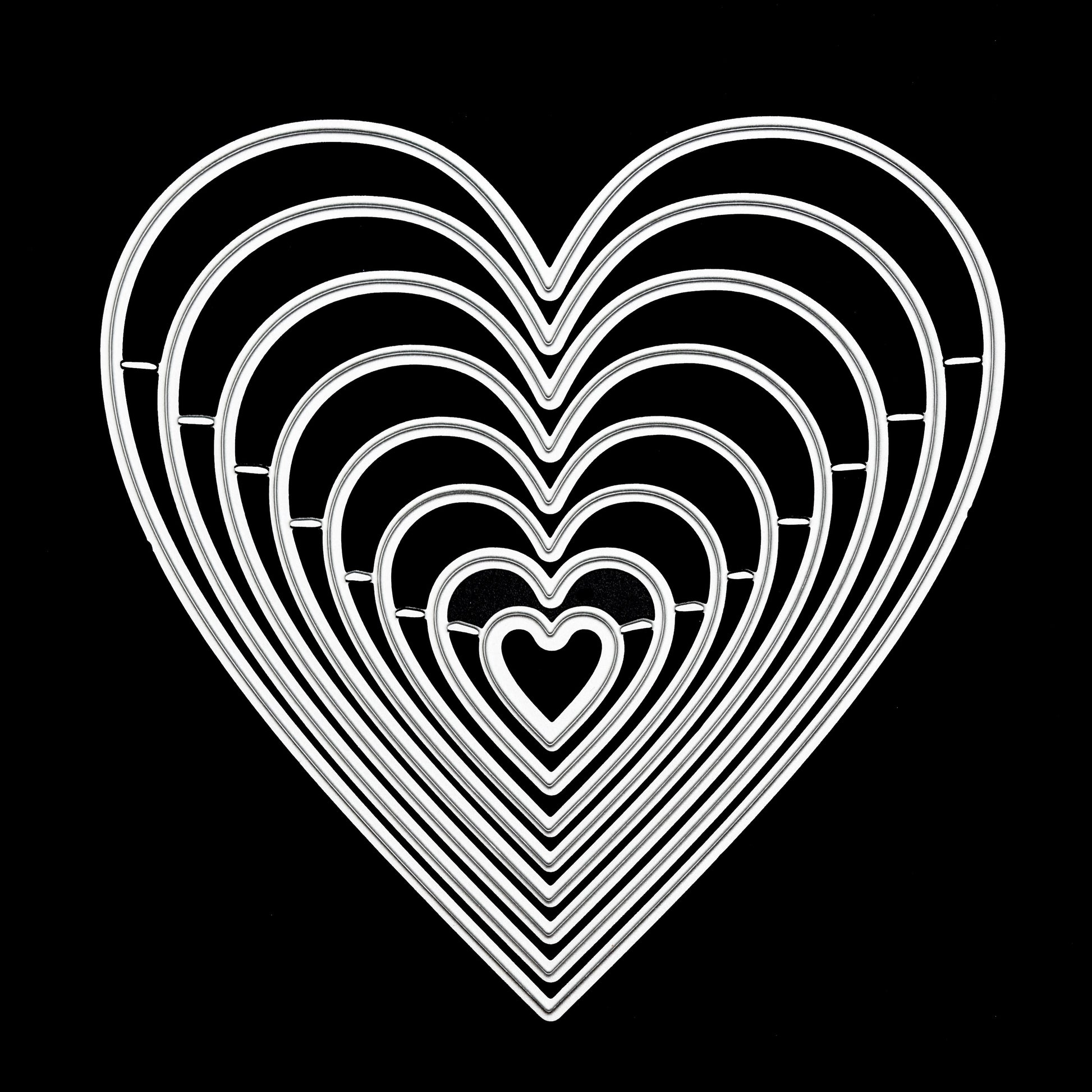 Heart nesting metal cutting dies set on black background