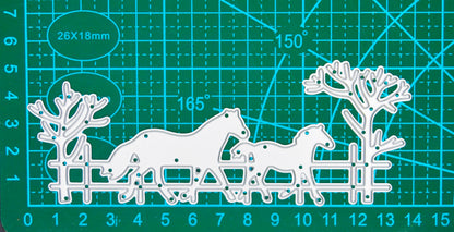 Horse and foal countryside scene metal cutting die displayed on a centimetre cutting mat for size guidance.