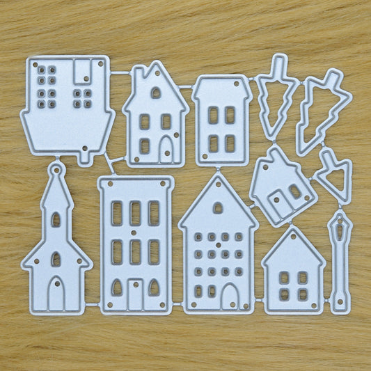 House and tree metal cutting dies set on faux fur background