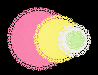 Layered lace circle paper cut shapes made using nesting metal cutting dies
