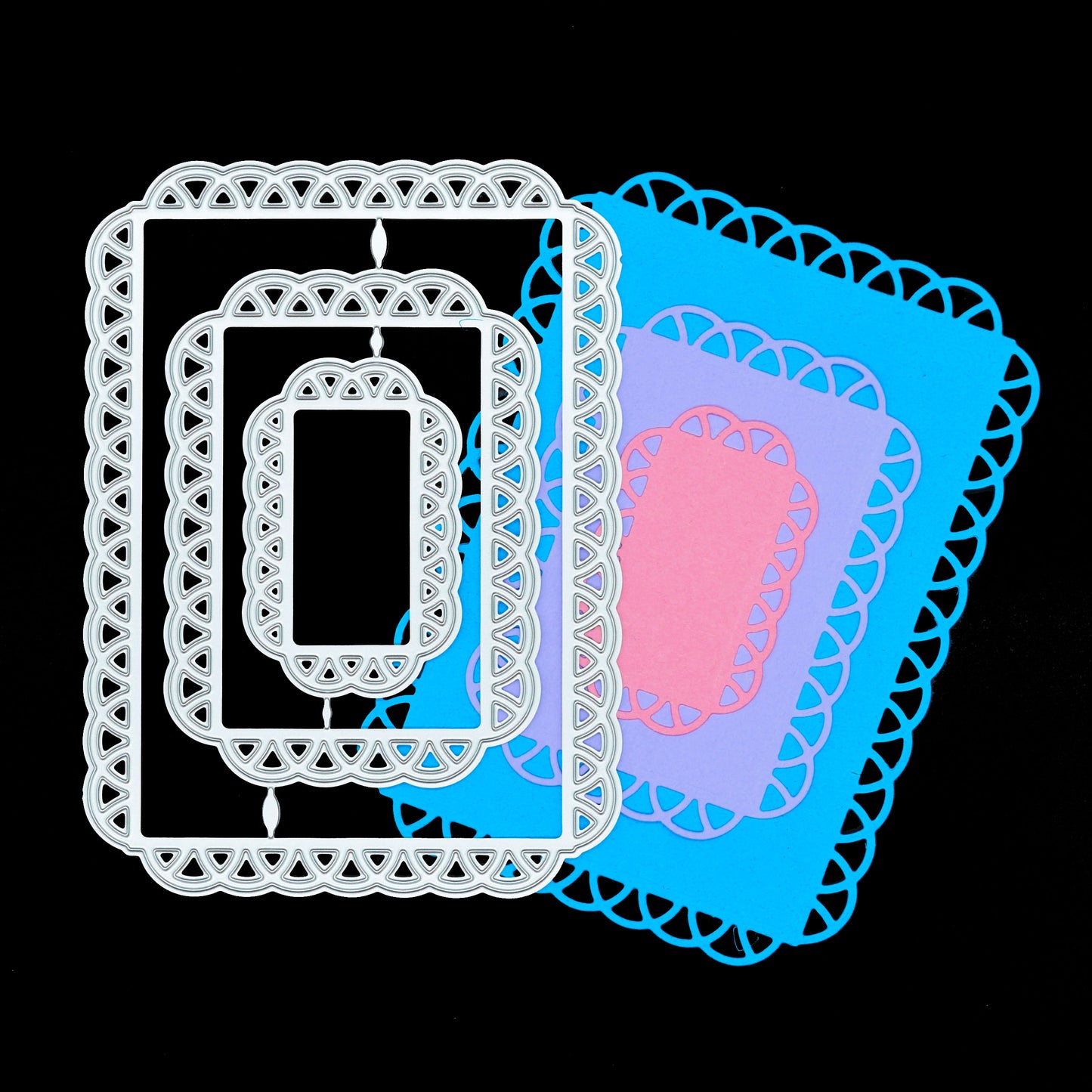 Three lace edge rectangle metal cutting dies displayed with coordinating layered cardstock cuts for card making.