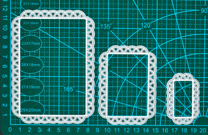 Three decorative lace edge rectangle metal cutting dies shown on a measurement mat for card making and papercraft.