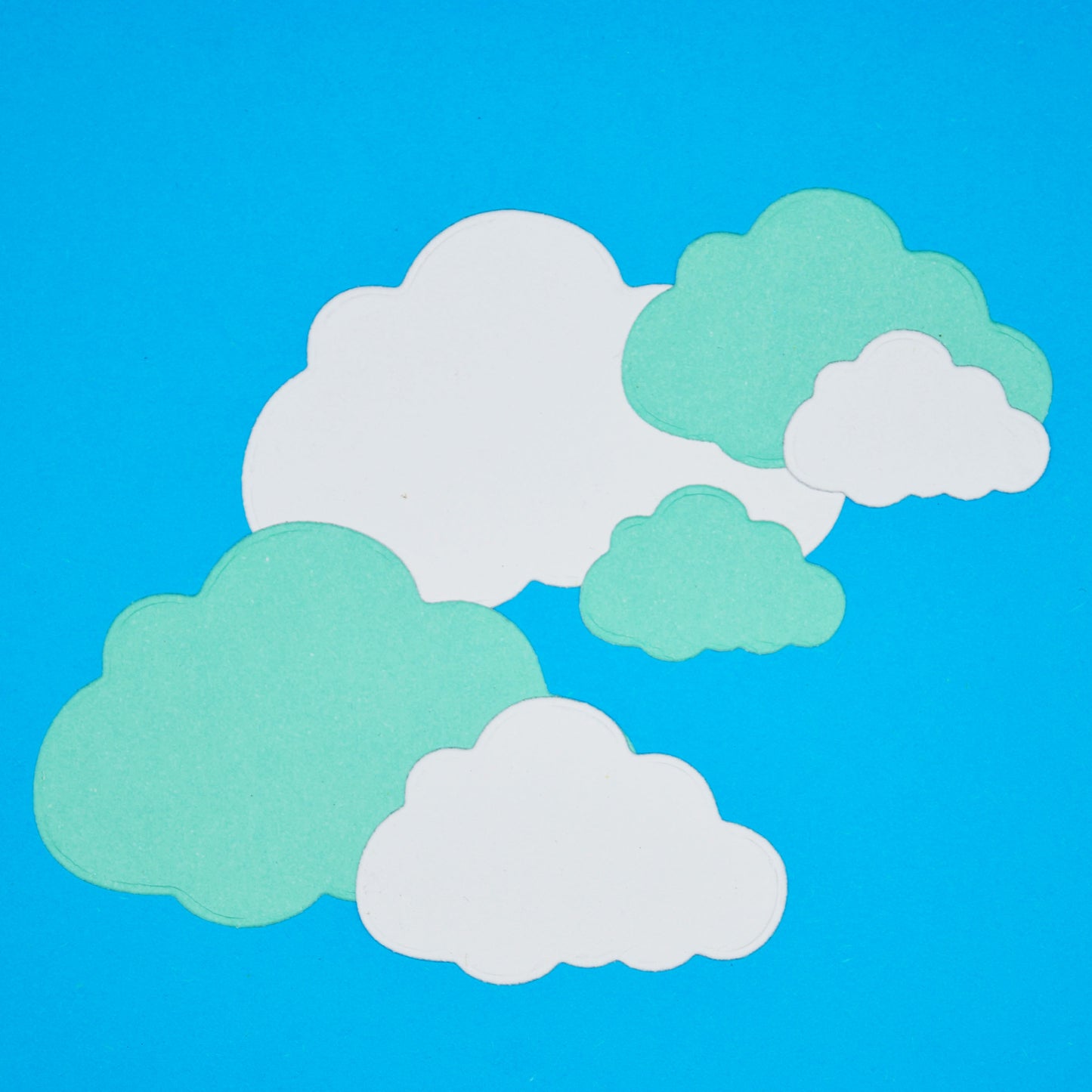 Layered cloud die cut examples created using cloud nesting metal cutting dies