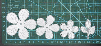Layered flower metal cutting dies showing graduated petal sizes for 3D flower making