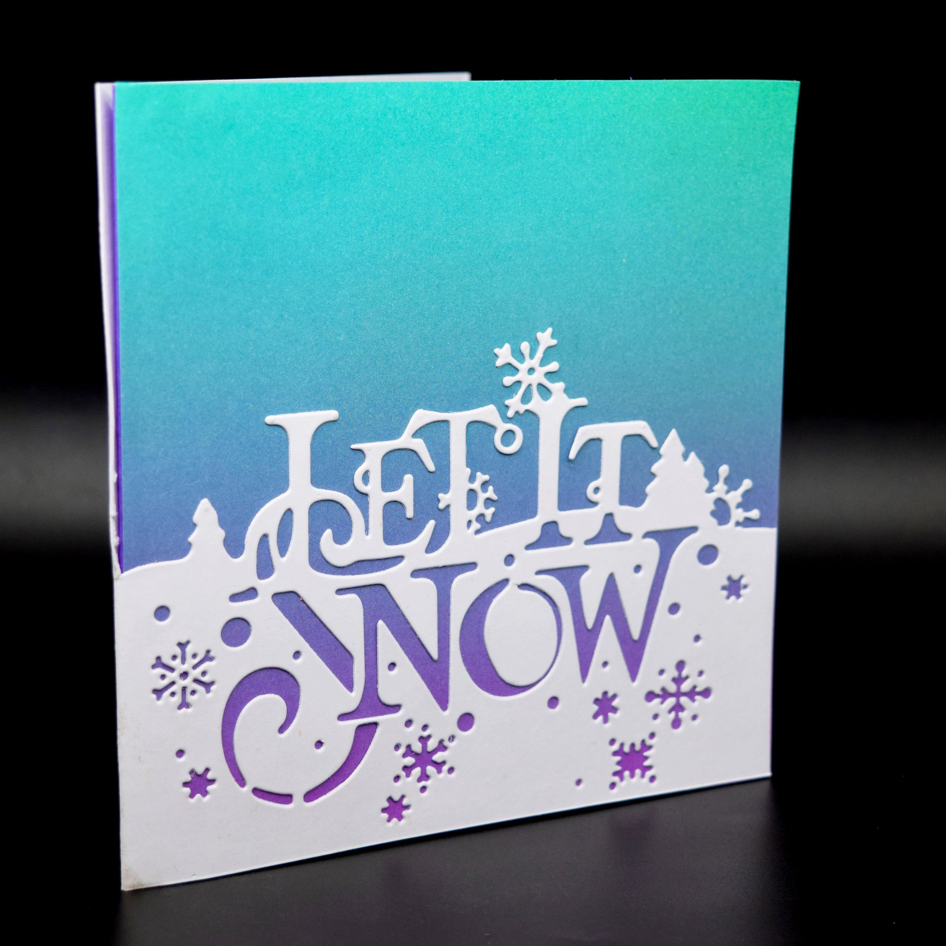 Let it snow metal cutting die used to create a winter themed greeting card