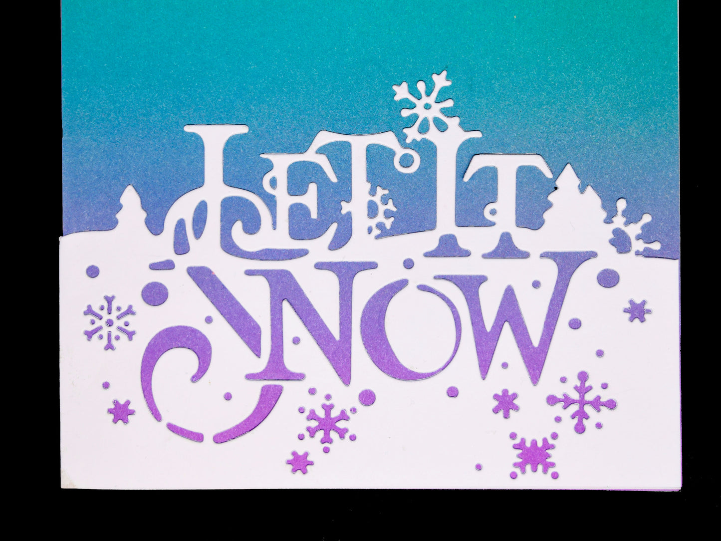 Let it snow die cut card design with snowflakes and winter scene details