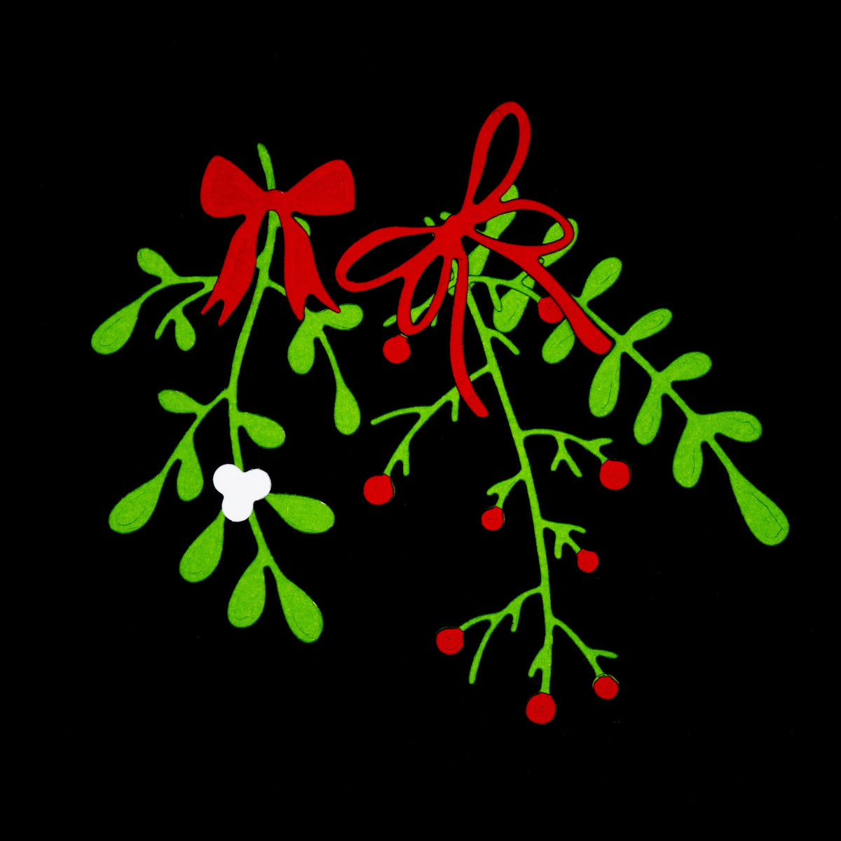 Green mistletoe and foliage paper cuts with red berries and bows created using Christmas metal cutting dies.