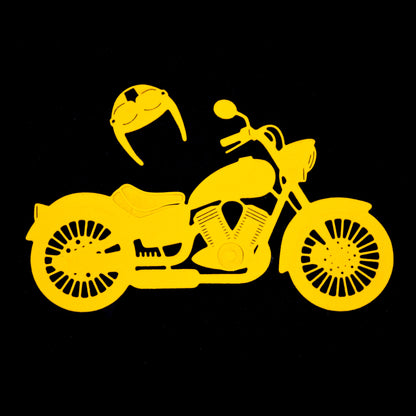 Motorbike shape cut from coloured card using metal die