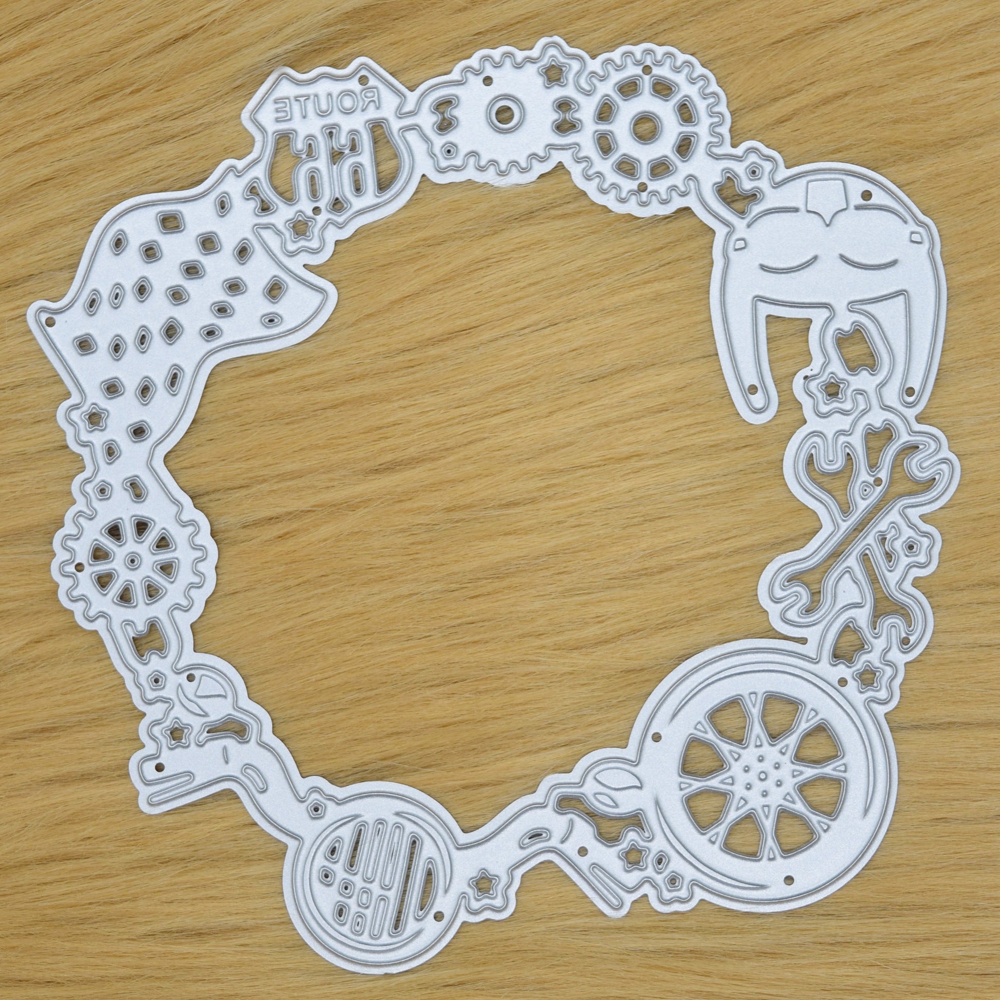 Motorcycle circular frame metal cutting die on faux fur background