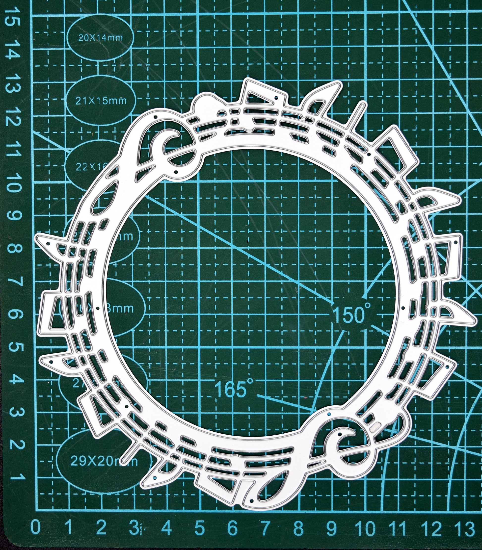 Music notes circle metal cutting die on cutting mat for scale