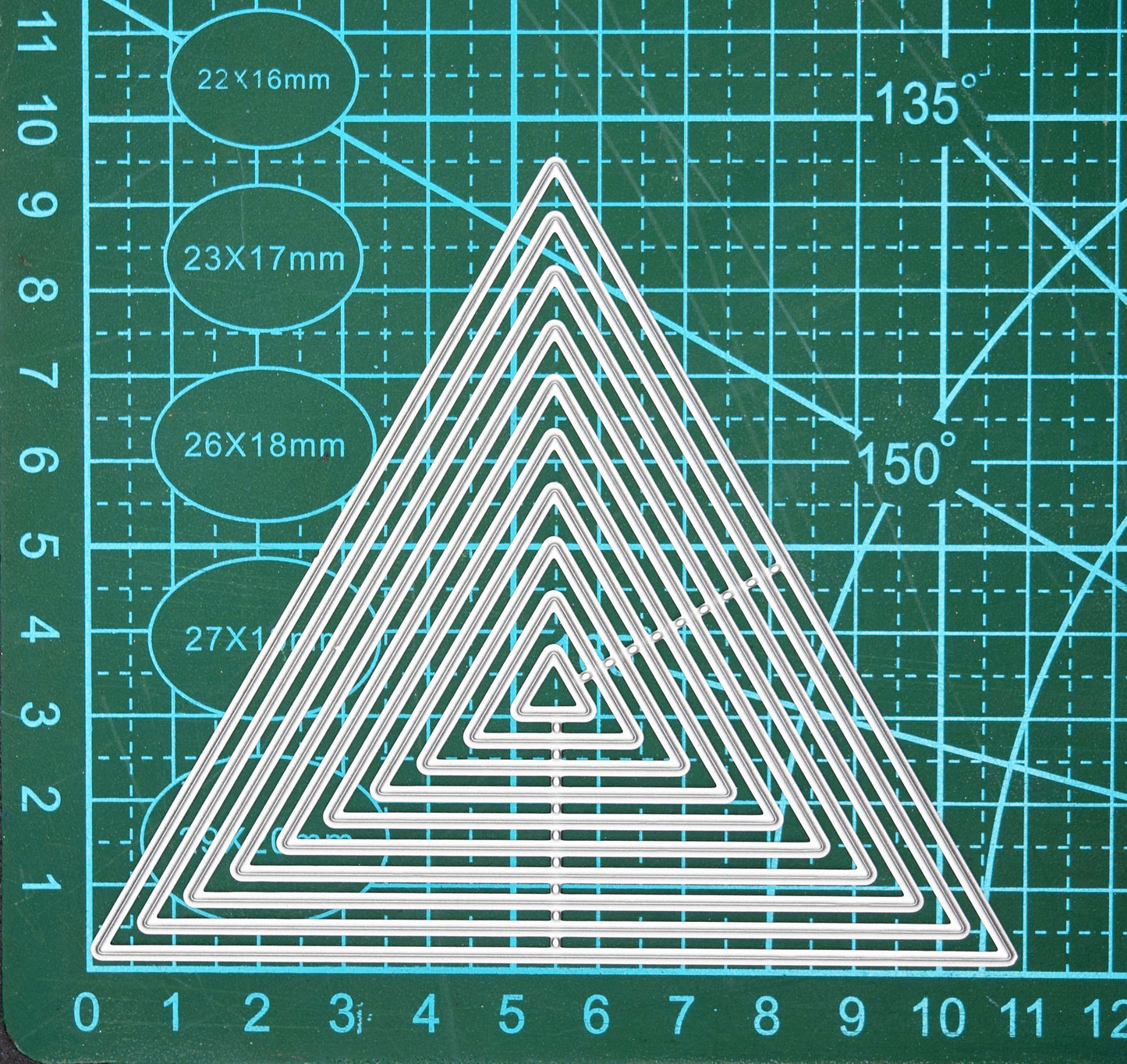 Nest of triangle metal cutting dies size reference on cutting mat for card making