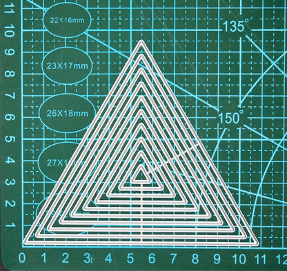 Nest of triangle metal cutting dies size reference on cutting mat for card making